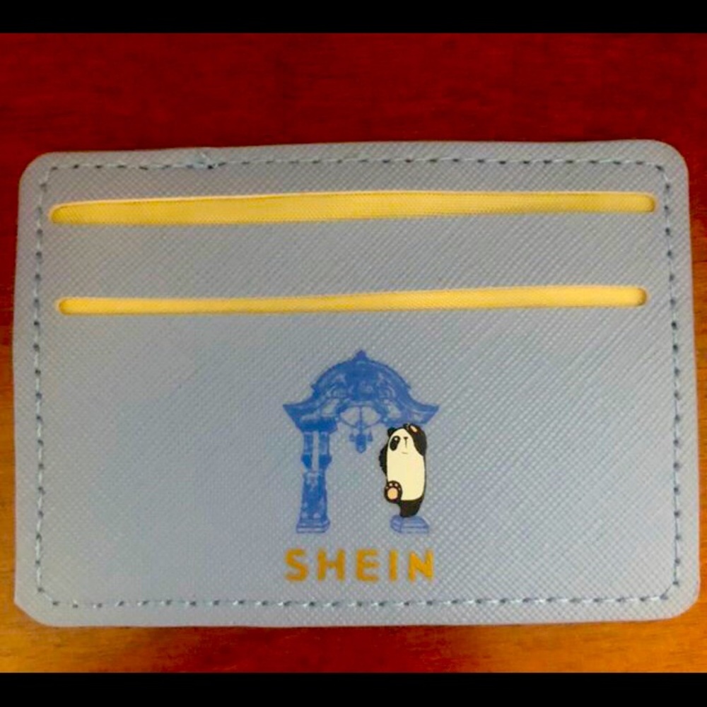 Light blue wallet with 4 pockets